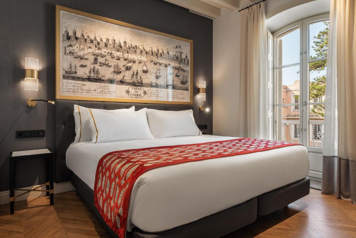 Cama o camas de una habitación en Áurea Casa Palacio Sagasta by Eurostars Hotel Company