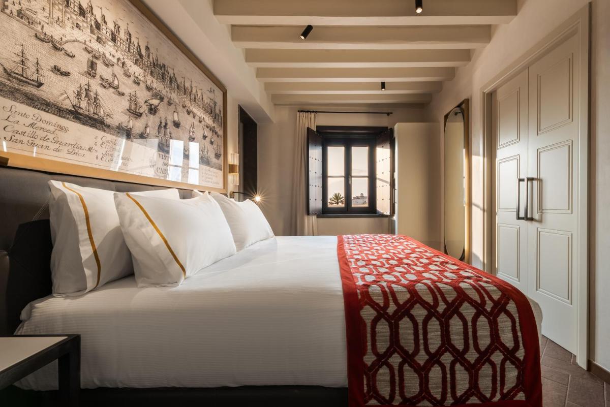 Cama o camas de una habitación en Áurea Casa Palacio Sagasta by Eurostars Hotel Company