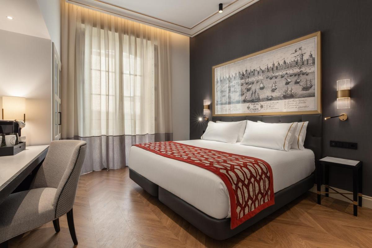 Cama o camas de una habitación en Áurea Casa Palacio Sagasta by Eurostars Hotel Company