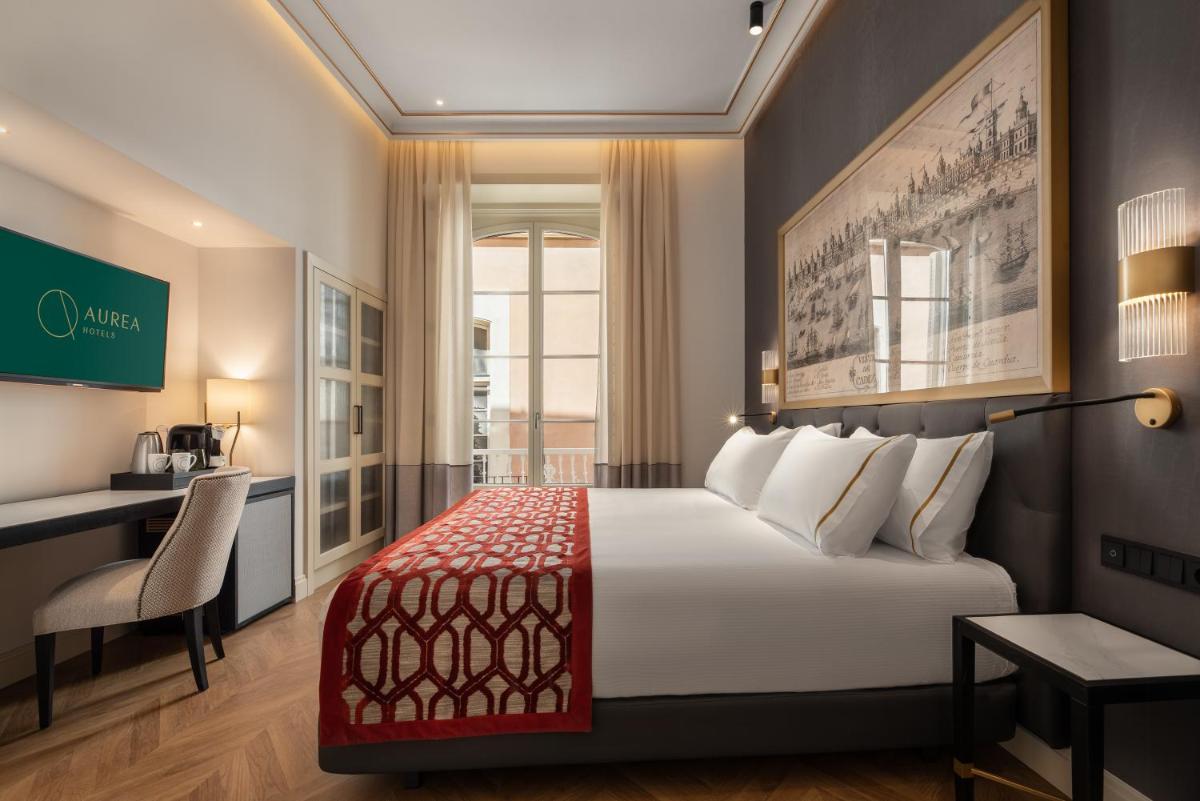 Cama o camas de una habitación en Áurea Casa Palacio Sagasta by Eurostars Hotel Company