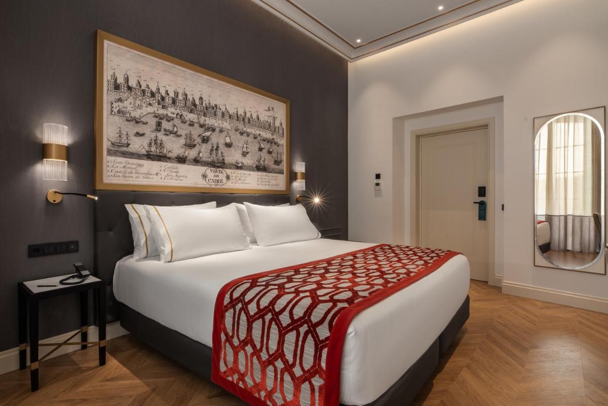 Cama o camas de una habitación en Áurea Casa Palacio Sagasta by Eurostars Hotel Company