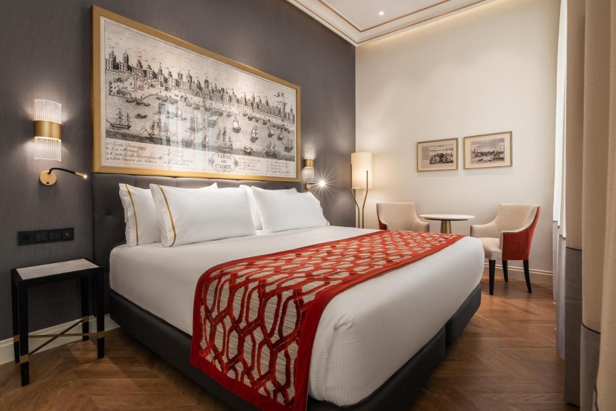 Cama o camas de una habitación en Áurea Casa Palacio Sagasta by Eurostars Hotel Company