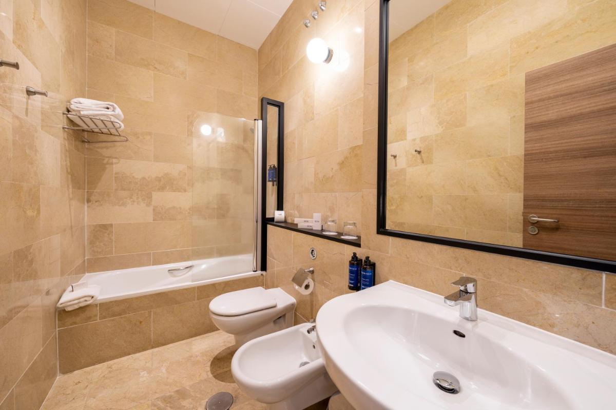 Un baño de Iberik Gran Balneario de Guitiriz