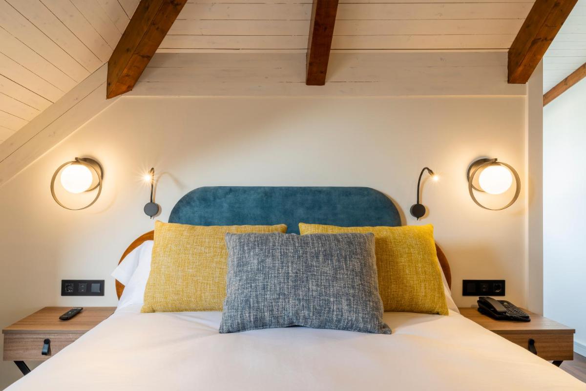 Cama o camas de una habitación en Iberik Gran Balneario de Guitiriz
