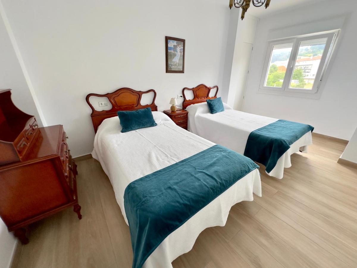 Apartamentos Sinás Playa - Housity