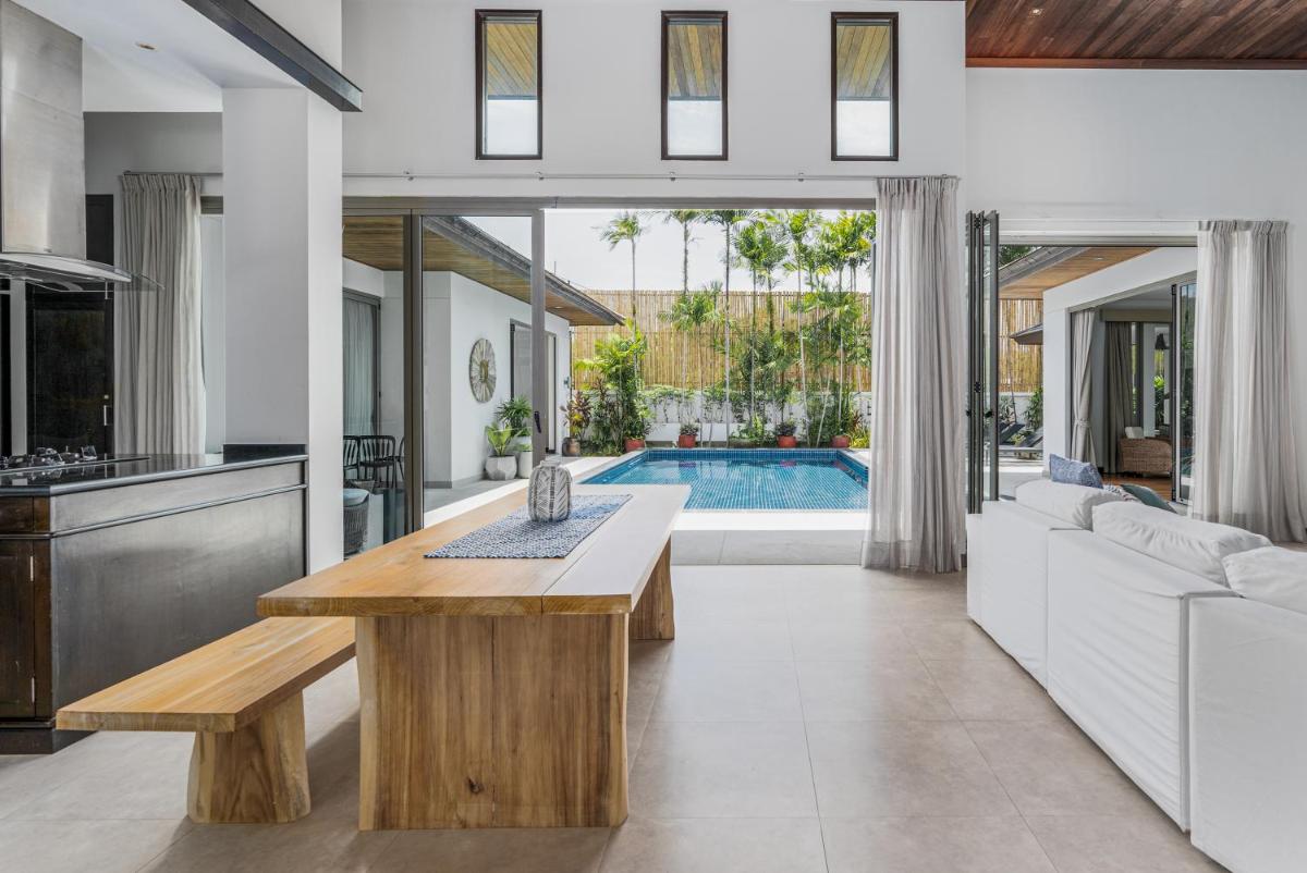 Discover a Tropical Hideaway within walking distance to Bang Tao Beach - Housity