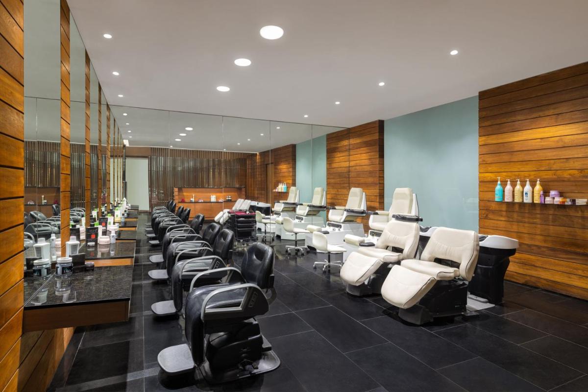 a salon with a row of chairs and tables at ITC Sonar, a Luxury Collection Hotel, Kolkata in Kolkata
