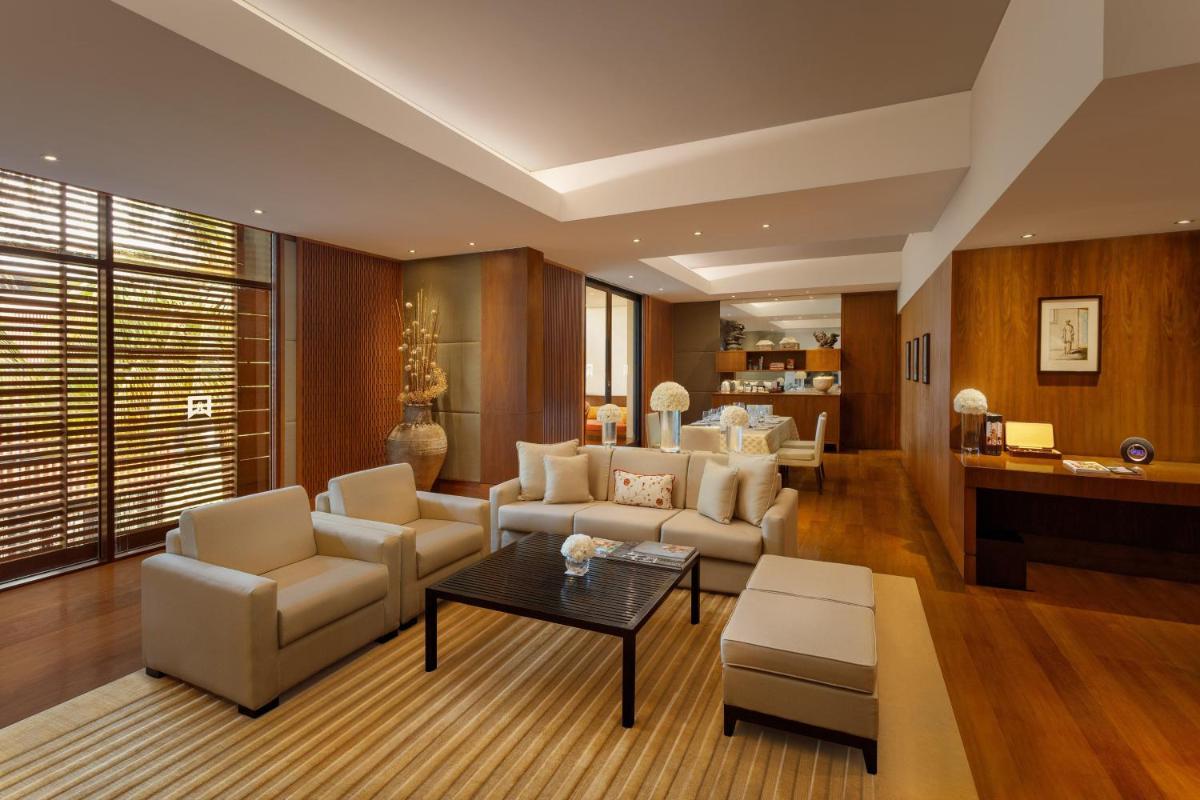 a living room with couches and a table at ITC Sonar, a Luxury Collection Hotel, Kolkata in Kolkata
