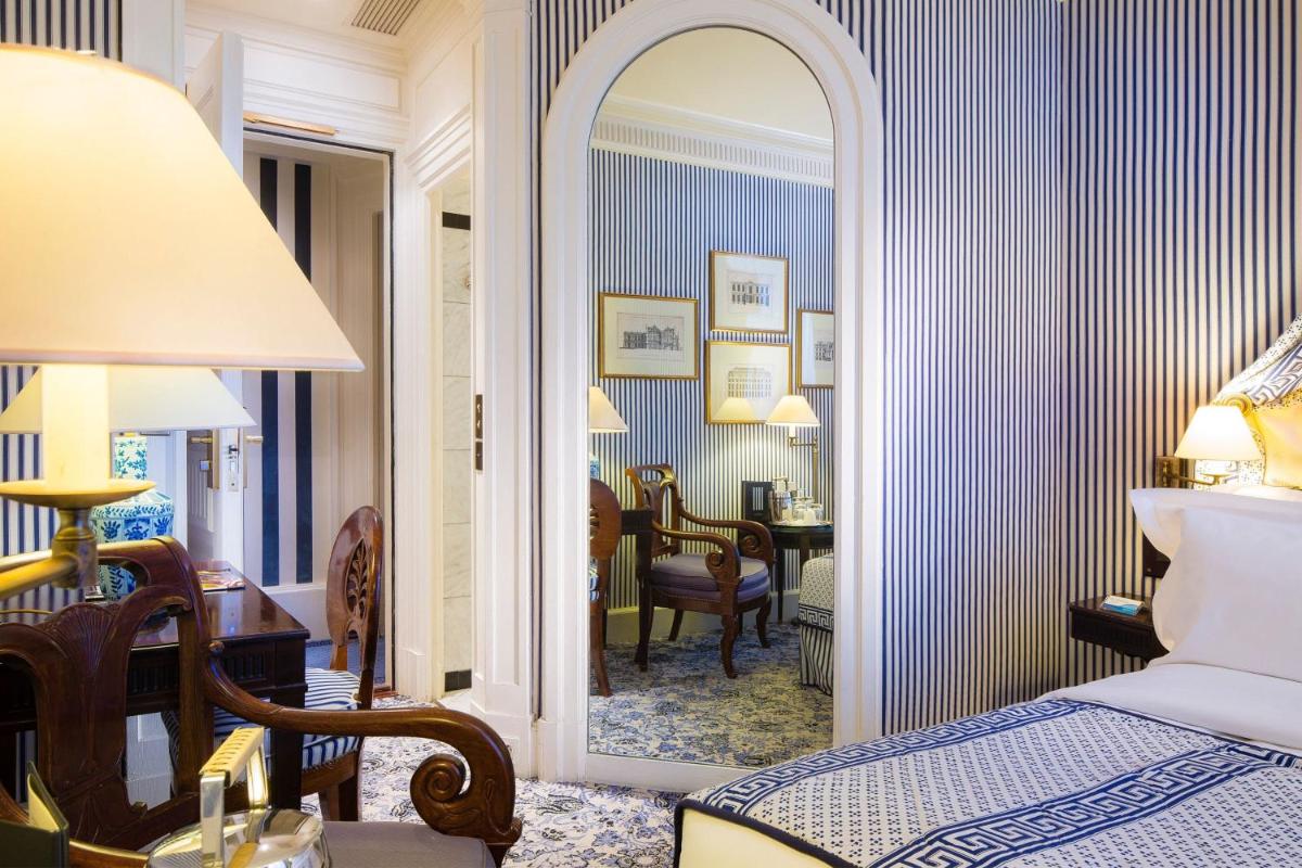 Un ou plusieurs lits dans un hébergement de l'établissement Le Dokhan's Paris Arc de Triomphe, a Tribute Portfolio Hotel