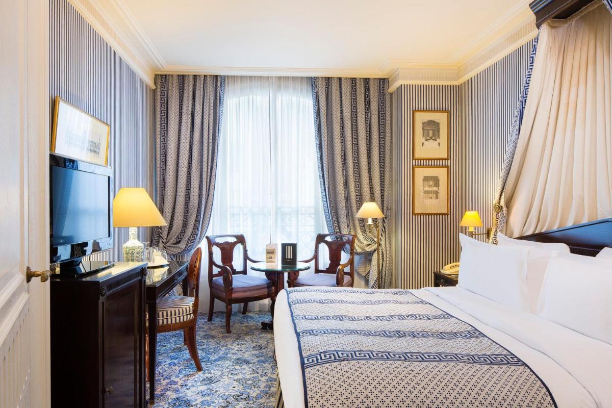 Un ou plusieurs lits dans un hébergement de l'établissement Le Dokhan's Paris Arc de Triomphe, a Tribute Portfolio Hotel