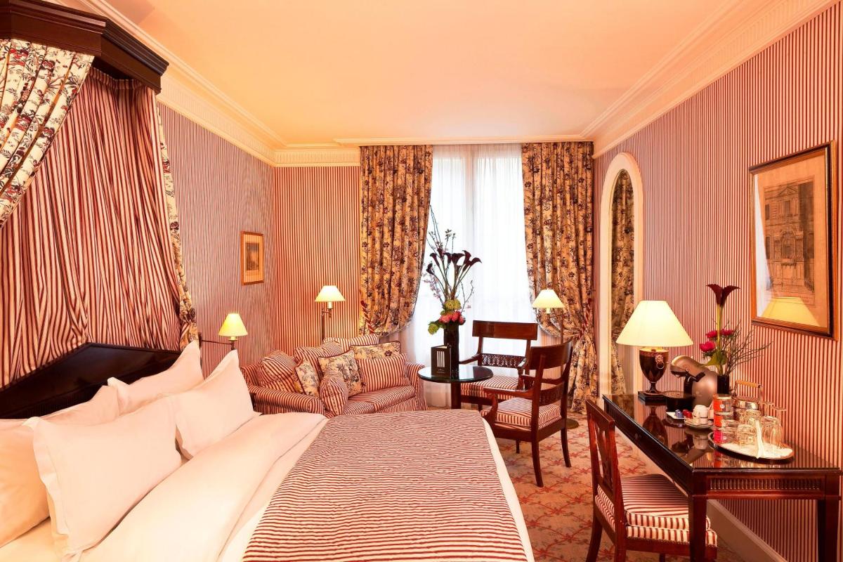 Un ou plusieurs lits dans un hébergement de l'établissement Le Dokhan's Paris Arc de Triomphe, a Tribute Portfolio Hotel