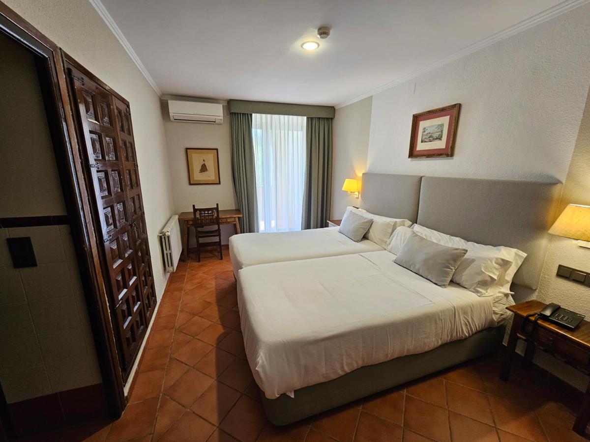 Cama o camas de una habitación en Monasterio De Piedra