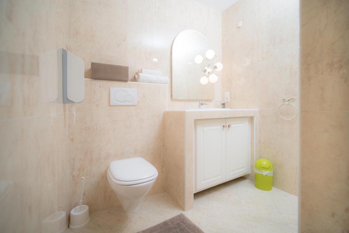 Salle de bains dans l'établissement Hôtel Beau Soleil