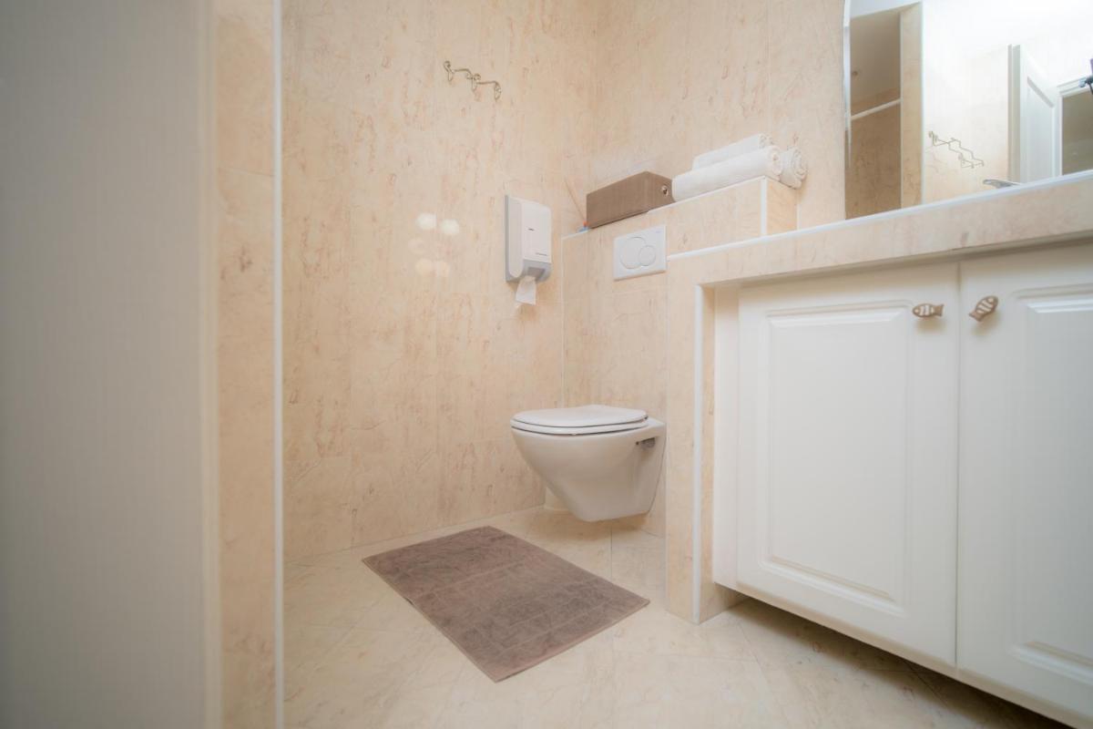 Salle de bains dans l'établissement Hôtel Beau Soleil