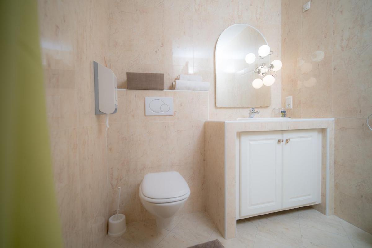 Salle de bains dans l'établissement Hôtel Beau Soleil