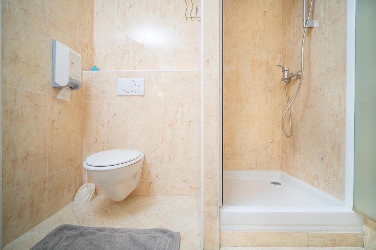 Salle de bains dans l'établissement Hôtel Beau Soleil