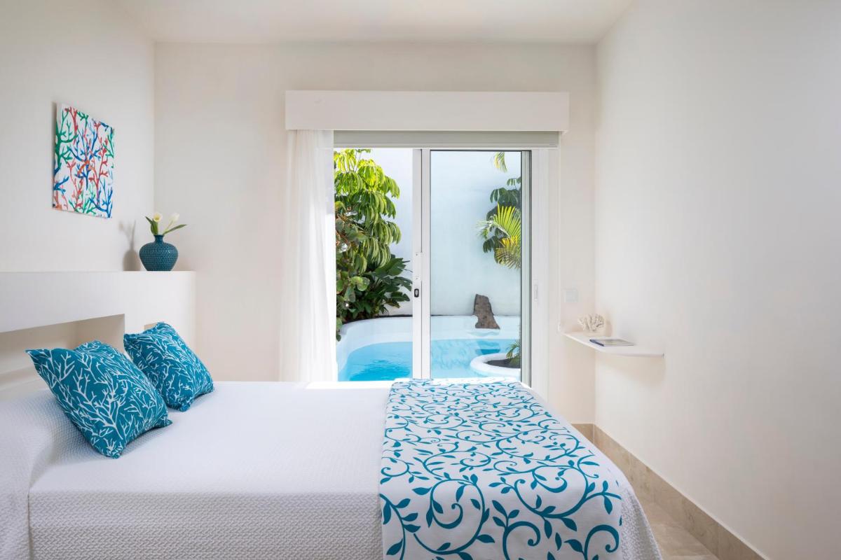 Cama o camas de una habitación en Bahiazul Resort Fuerteventura