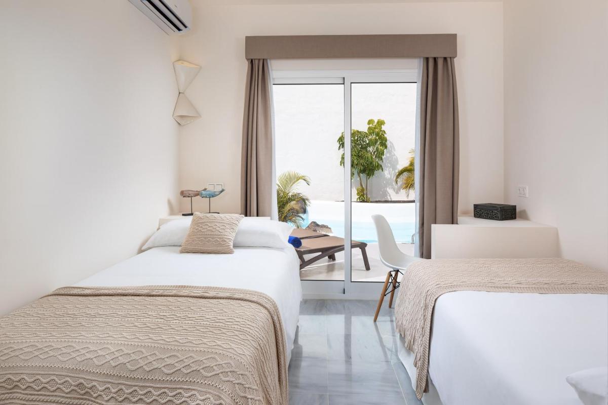 Cama o camas de una habitación en Bahiazul Resort Fuerteventura