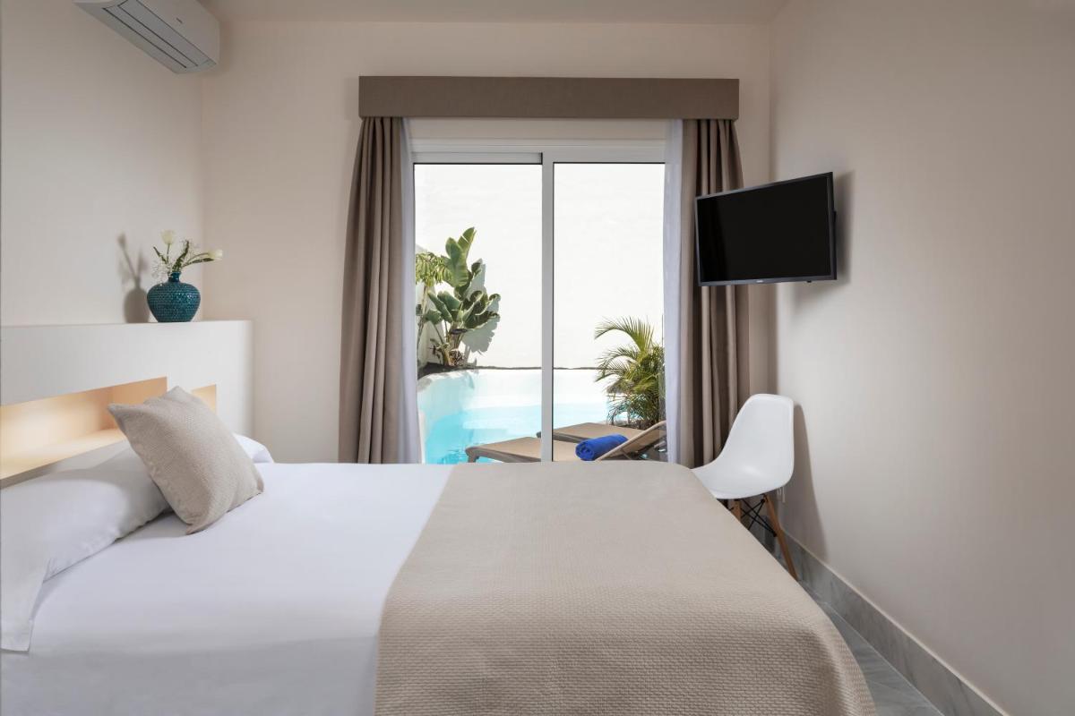 Cama o camas de una habitación en Bahiazul Resort Fuerteventura