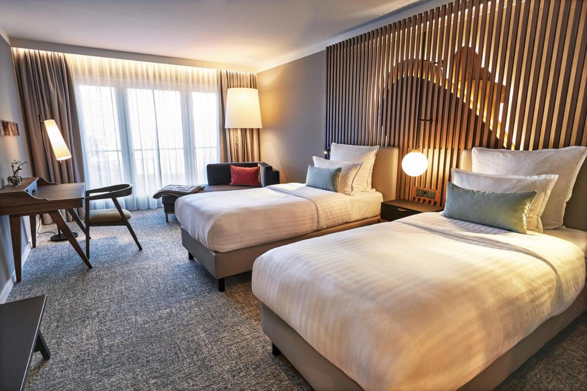 Ein Bett oder Betten in einem Zimmer der Unterkunft Steigenberger Hotel Hamburg Ein Bett oder Betten in einem Zimmer der Unterkunft Steigenberger Hotel Hamburg