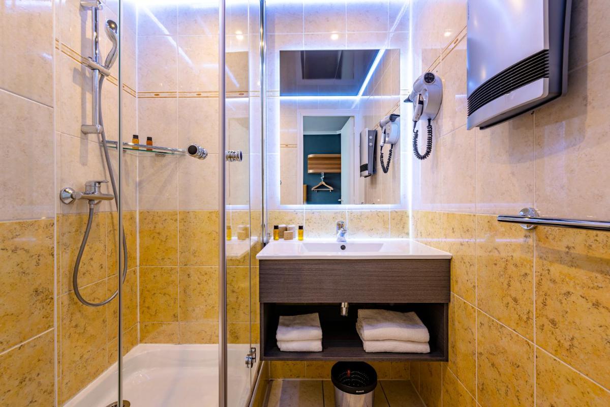 Salle de bains dans l'établissement Hotel Residence Europe & Spa