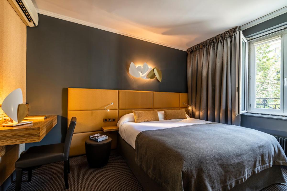 Un ou plusieurs lits dans un hébergement de l'établissement Hotel Residence Europe & Spa