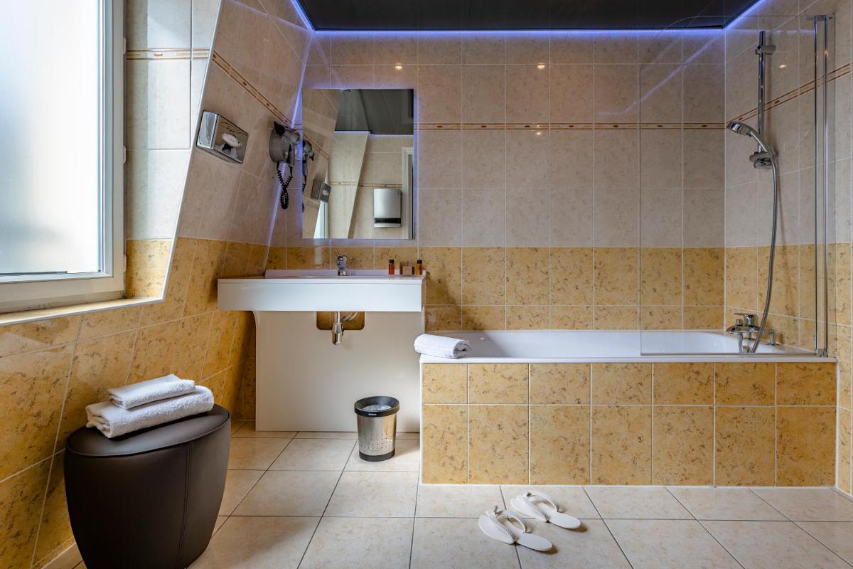 Salle de bains dans l'établissement Hotel Residence Europe & Spa