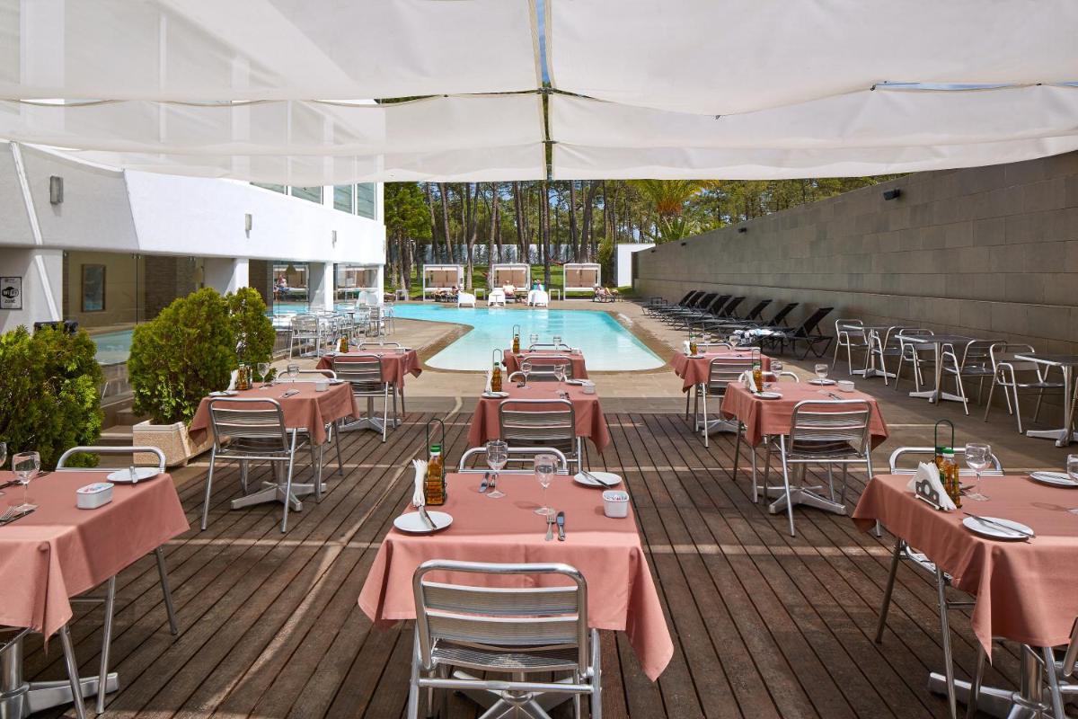 A piscina em ou perto de Alcazar Hotel & SPA