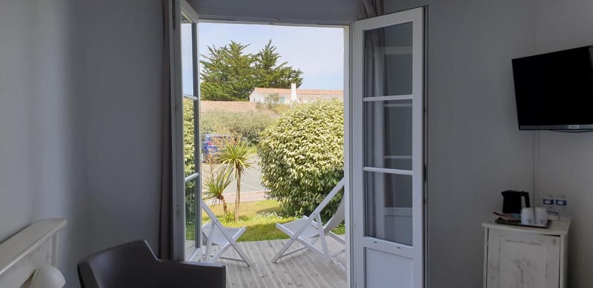 Télévision ou salle de divertissement dans l'établissement Thalacap Île de Ré - Thalasso & Spa