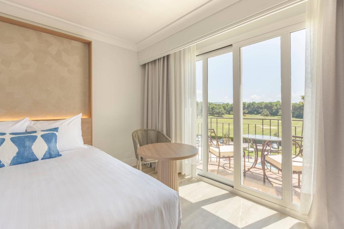 Cama o camas de una habitación en Denia Marriott La Sella Golf Resort & Spa