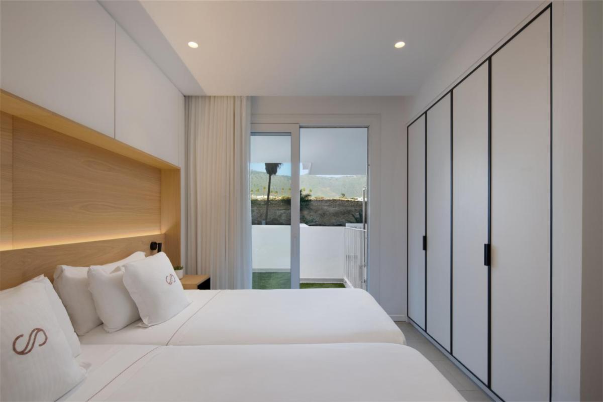 Cama o camas de una habitación en Royal Hideaway Corales Suites
