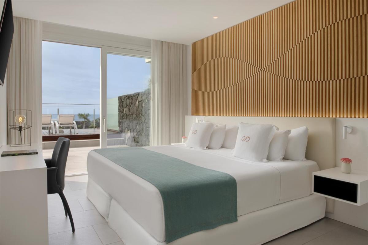 Cama o camas de una habitación en Royal Hideaway Corales Suites
