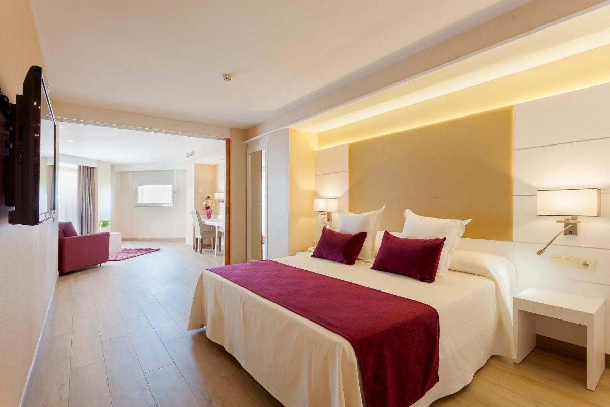 Cama o camas de una habitación en Hotel Beverly Park & Spa