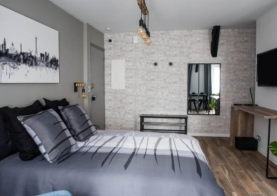 Beau studio STYLE INDUSTRIEL - Housity