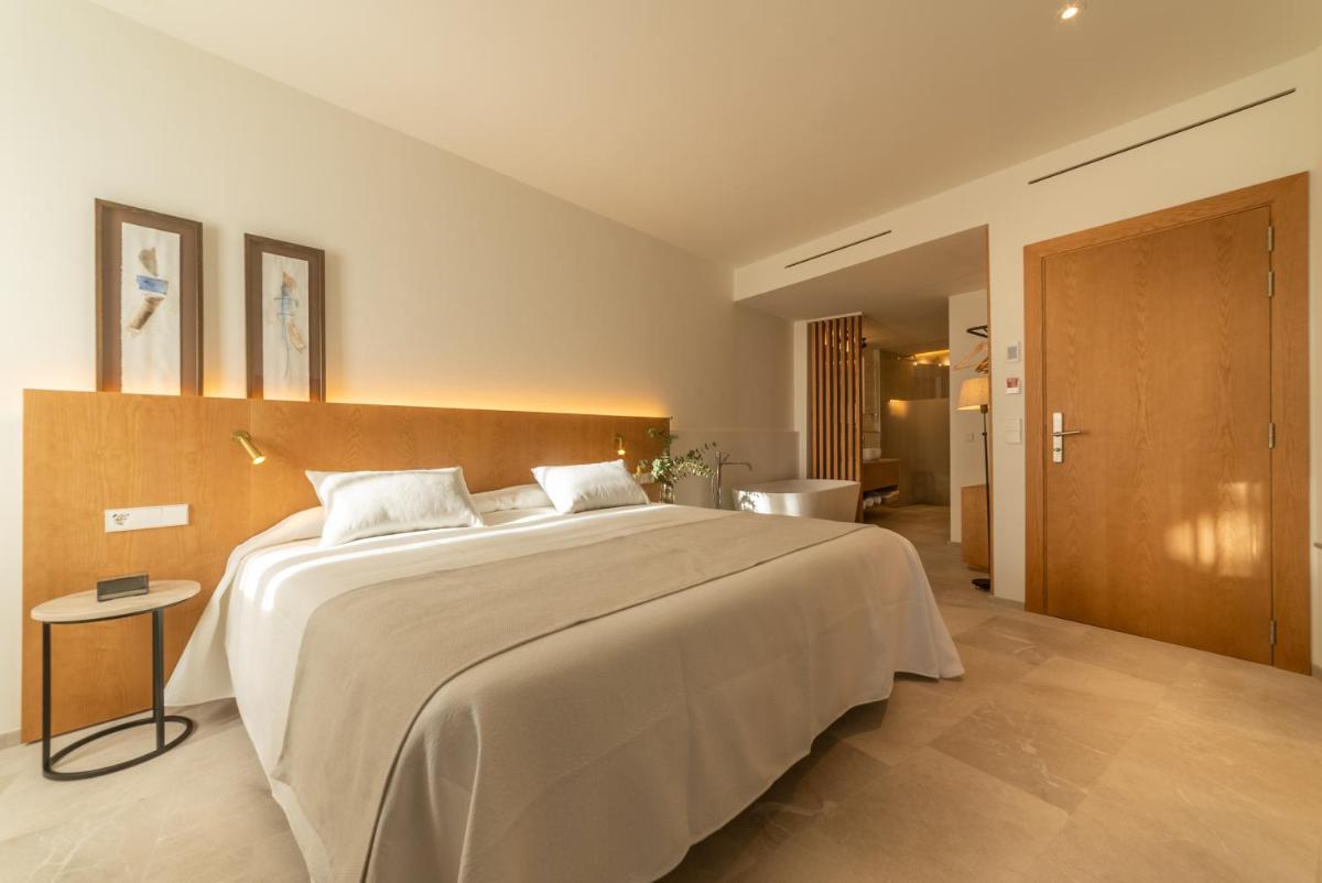 Cama o camas de una habitación en Nema Boutique Hotel & Spa
