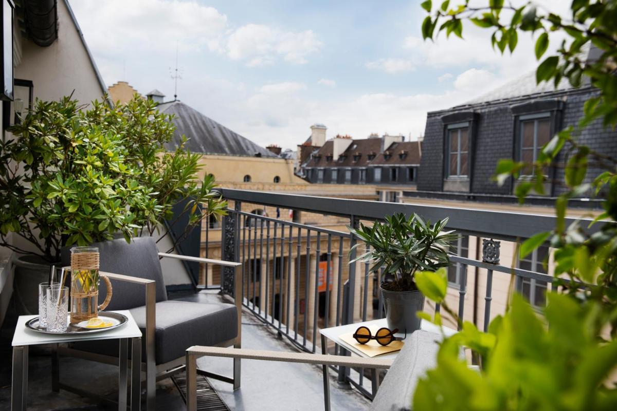 Balcon ou terrasse dans l'établissement Hôtel Baume