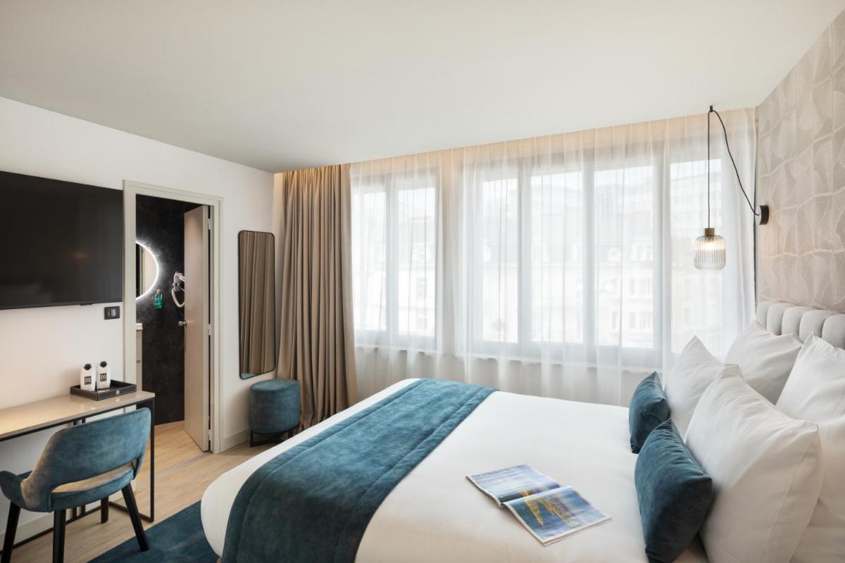 Un ou plusieurs lits dans un hébergement de l'établissement Hôtel & Spa Le Maury, Vannes, The Originals Boutique