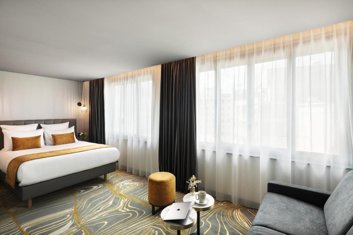 Un ou plusieurs lits dans un hébergement de l'établissement Hôtel & Spa Le Maury, Vannes, The Originals Boutique