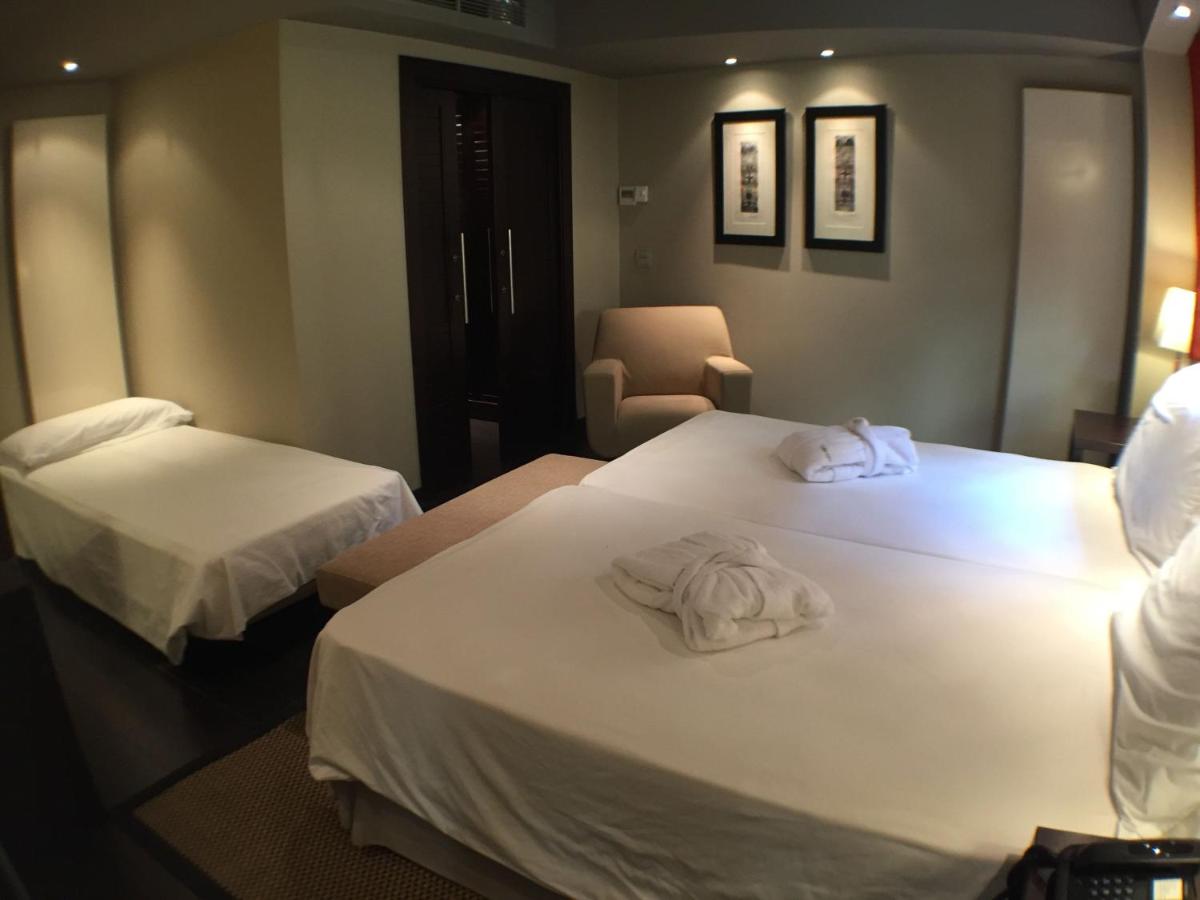 Cama o camas de una habitación en Hotel La Trufa Negra