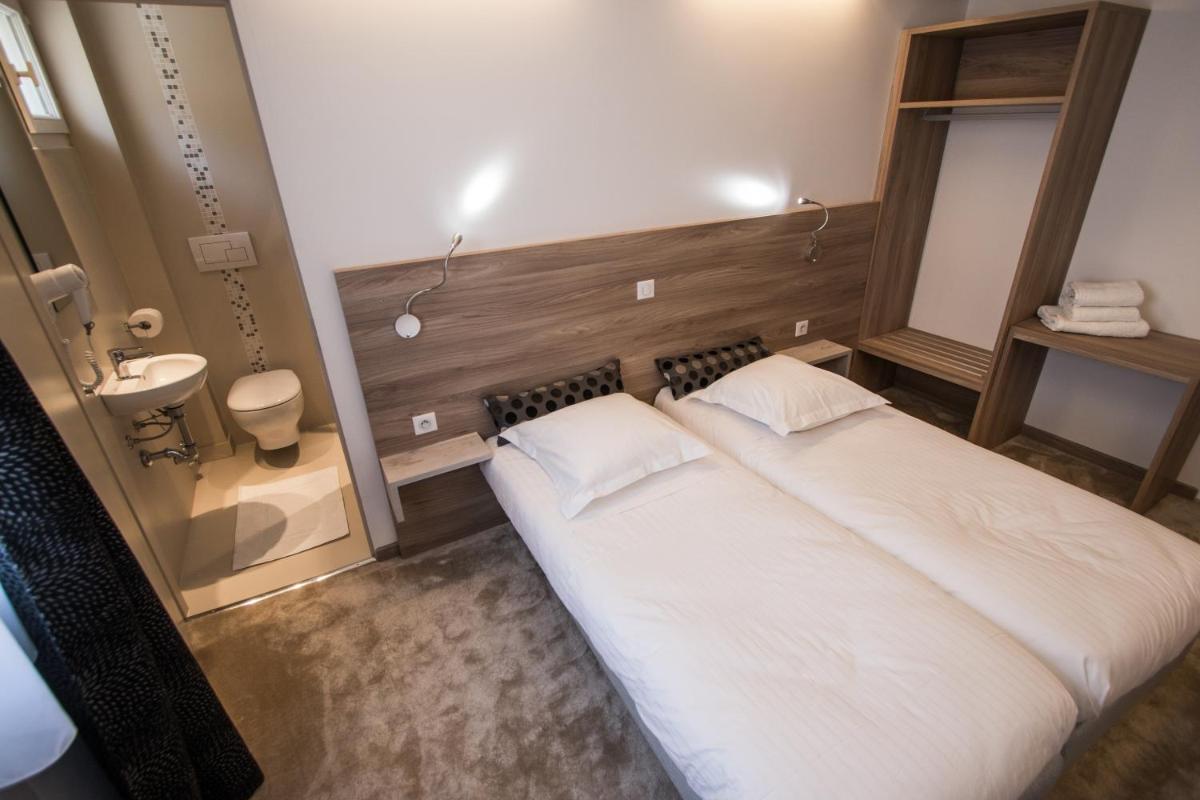 Hotel Les Voyageurs - Housity