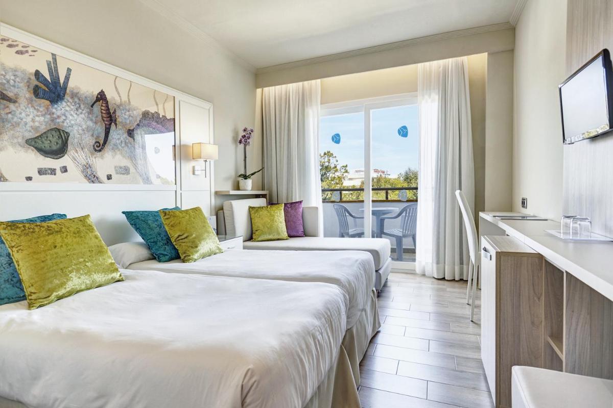 Cama o camas de una habitación en Grupotel Maritimo