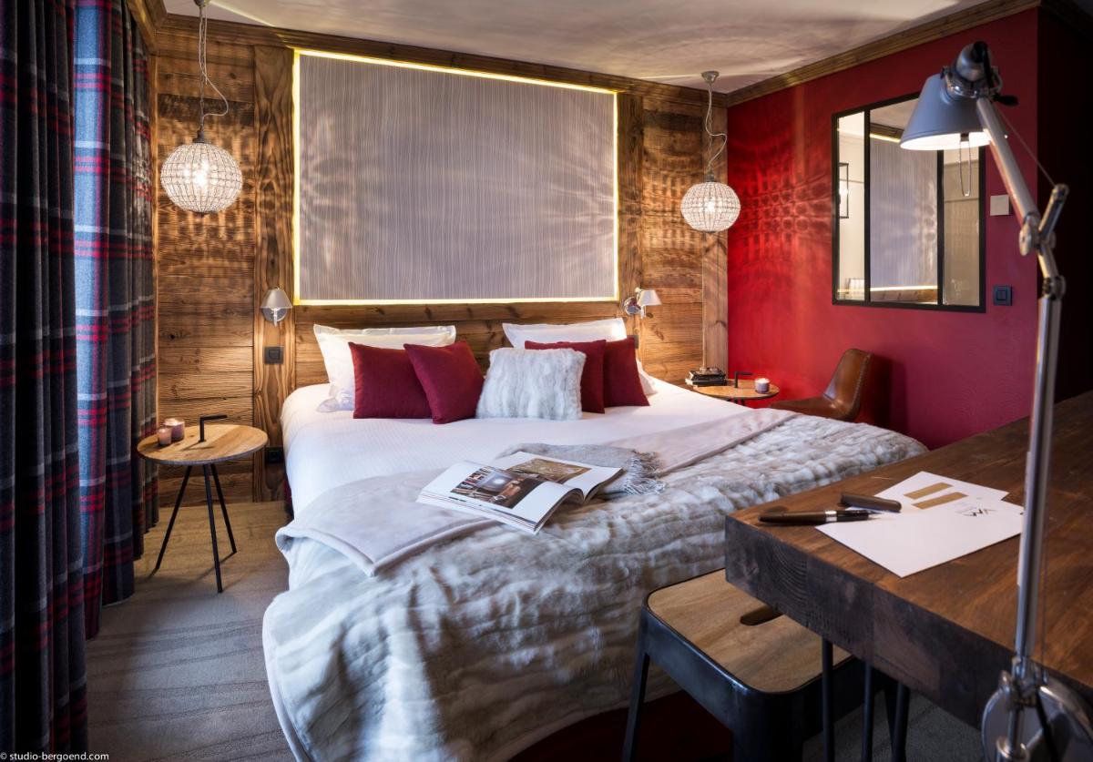 Un ou plusieurs lits dans un hébergement de l'établissement Hôtel Village Montana by Les Etincelles