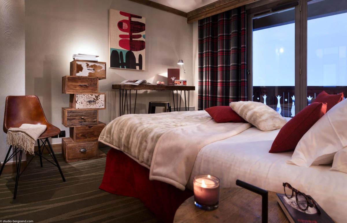 Un ou plusieurs lits dans un hébergement de l'établissement Hôtel Village Montana by Les Etincelles
