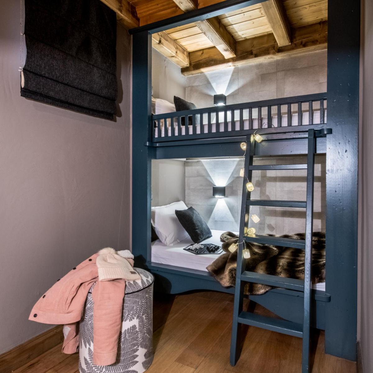 Un ou plusieurs lits dans un hébergement de l'établissement Hôtel Village Montana by Les Etincelles