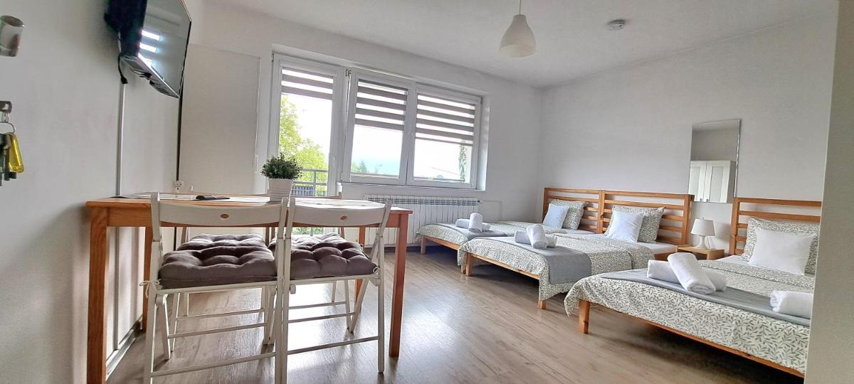 Pokoje i Apartamenty na Szkolnej - Housity
