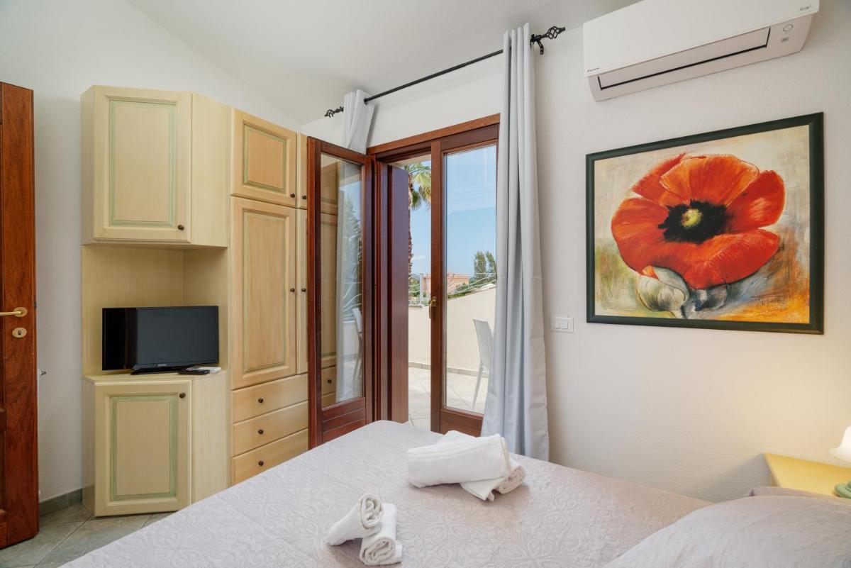 Rooms Tavolara - Housity