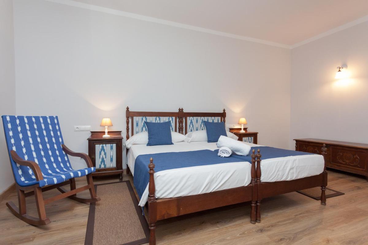 Cama o camas de una habitación en Hotel El Guía