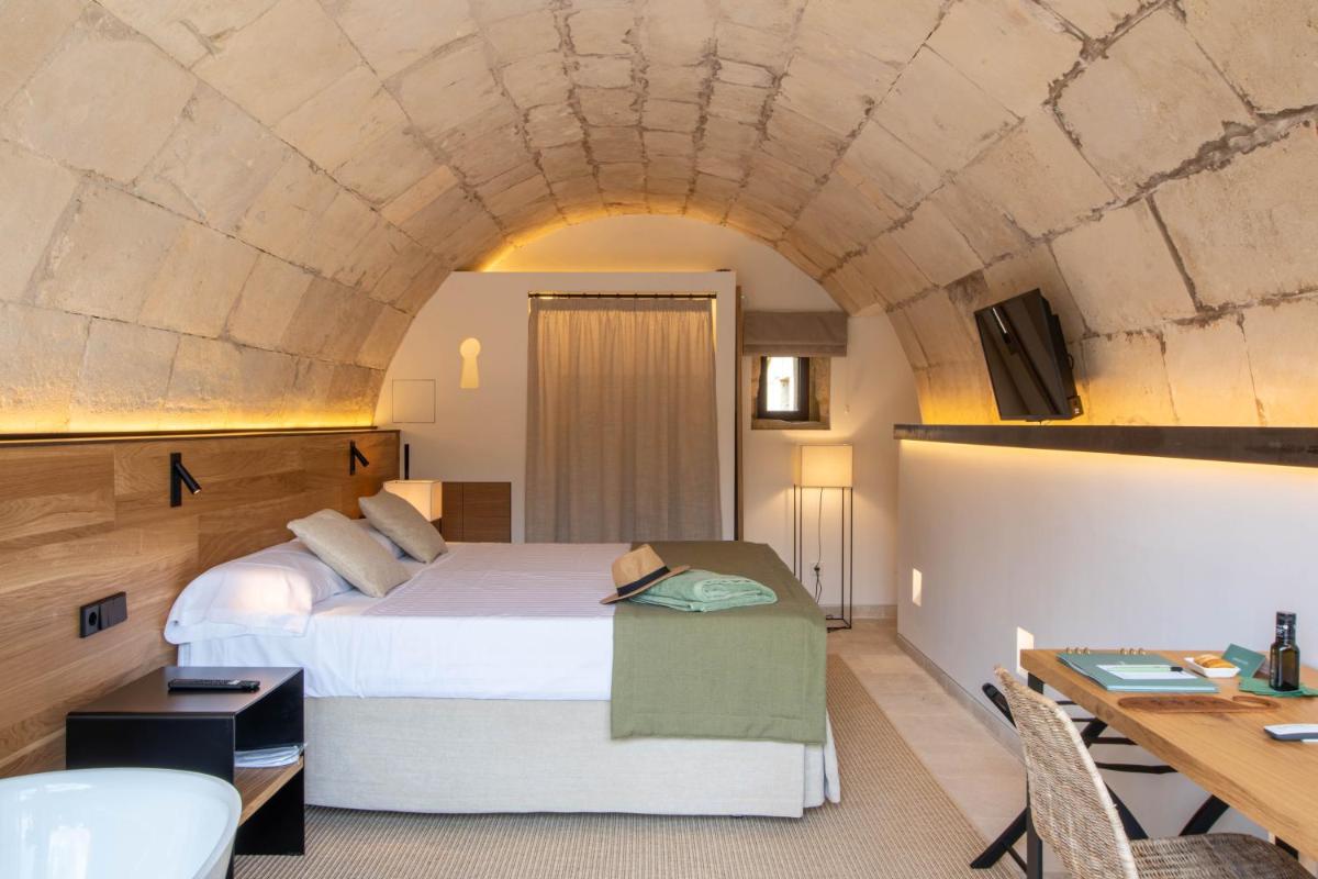 Cama o camas de una habitación en Fincahotel Treurer - Olive Grove & Grand House - Adults Only