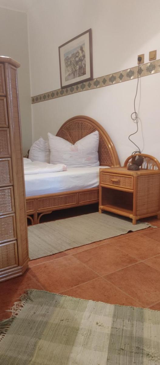 Napsugár Apartman - Housity