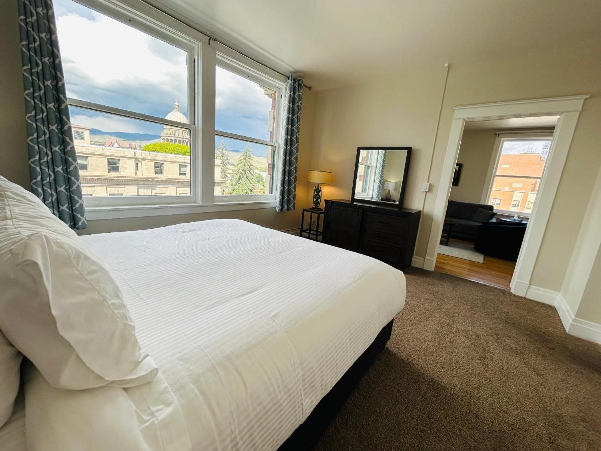 Suitetrails - Downtown Digs-View of the City! Stay above local restaurants and nightlife, posh amenities heated toilet seat, oversized rain shower head in glass shower, in-unit laundry, one garage parking spot